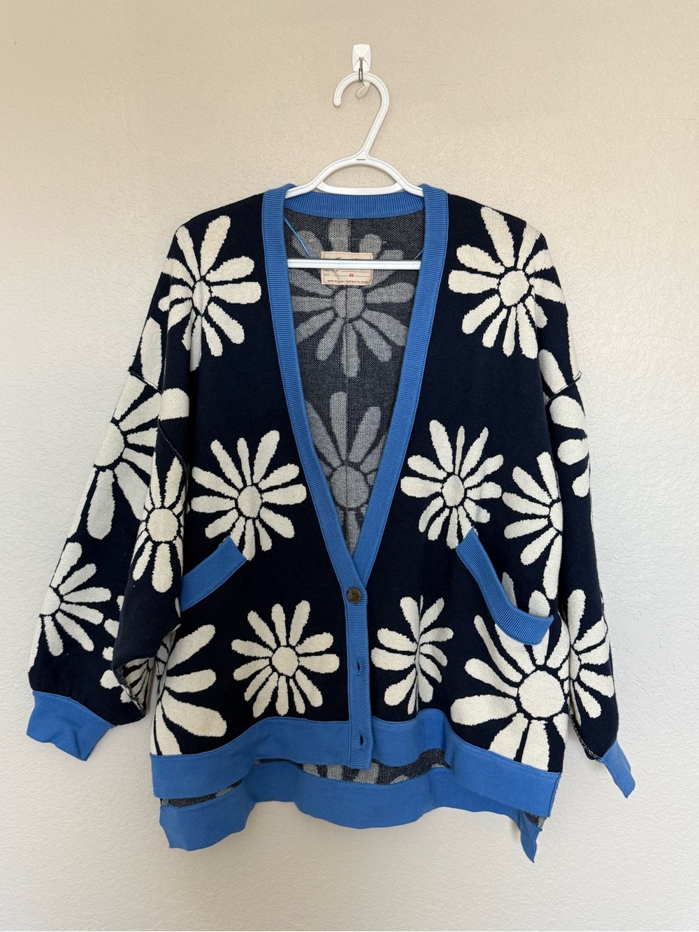 We The Free Navy Cardigan with White Daisy Pattern and Blue Trim